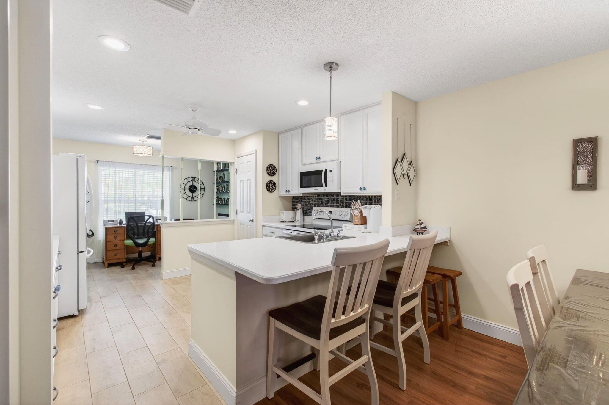 5452 Poppy Place, Unit D Delray Beach, FL 33484 - Photo 8 of 62 Open concept kitchen and mini desk area