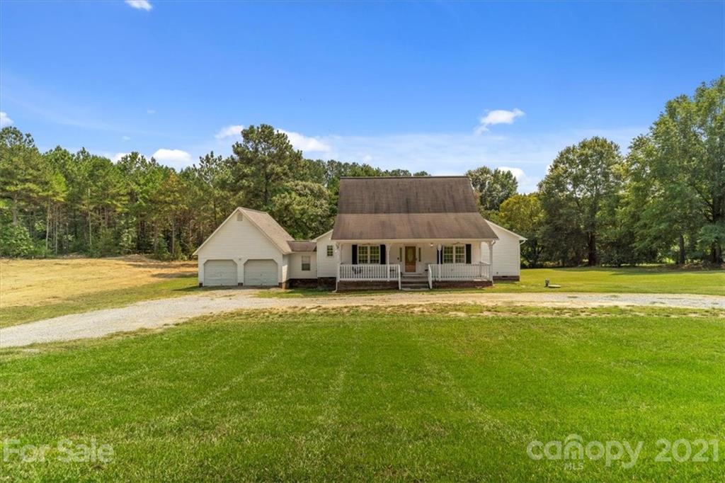 308 Kiser Road Bessemer City, NC 28016 - Photo 1 of 32 a front view of a house with a yard