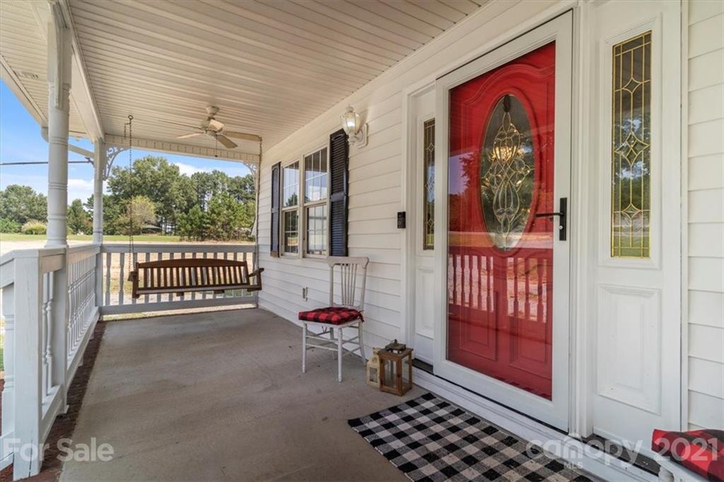 308 Kiser Road Bessemer City, NC 28016 - Photo 2 of 32 a balcony with furniture and next to a window