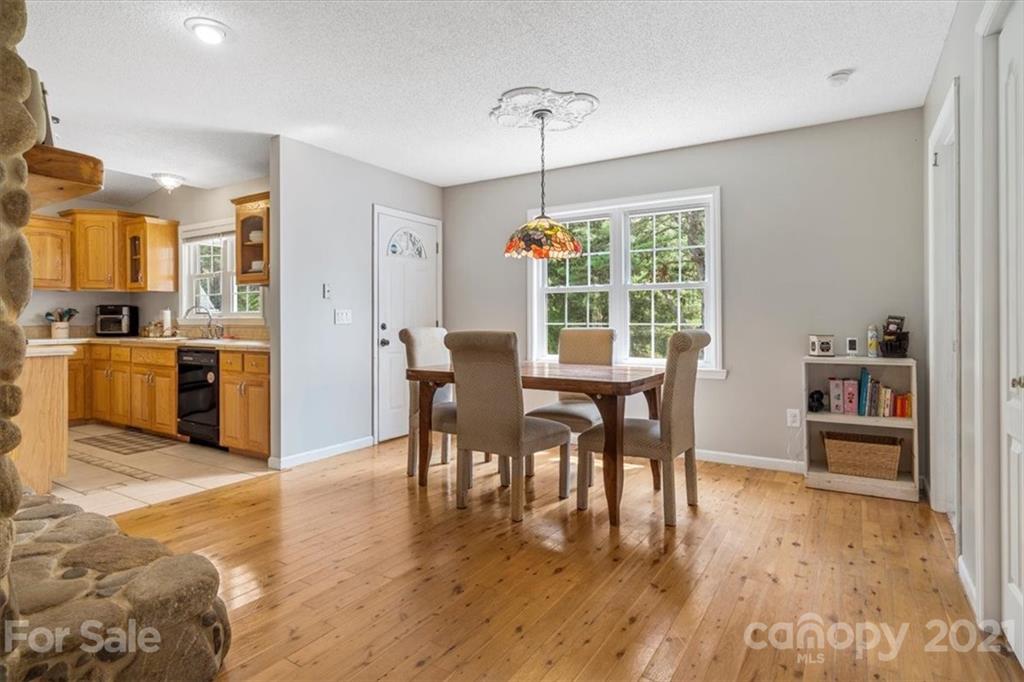 308 Kiser Road Bessemer City, NC 28016 - Photo 14 of 32 a view of a dining room with furniture window and wooden floor