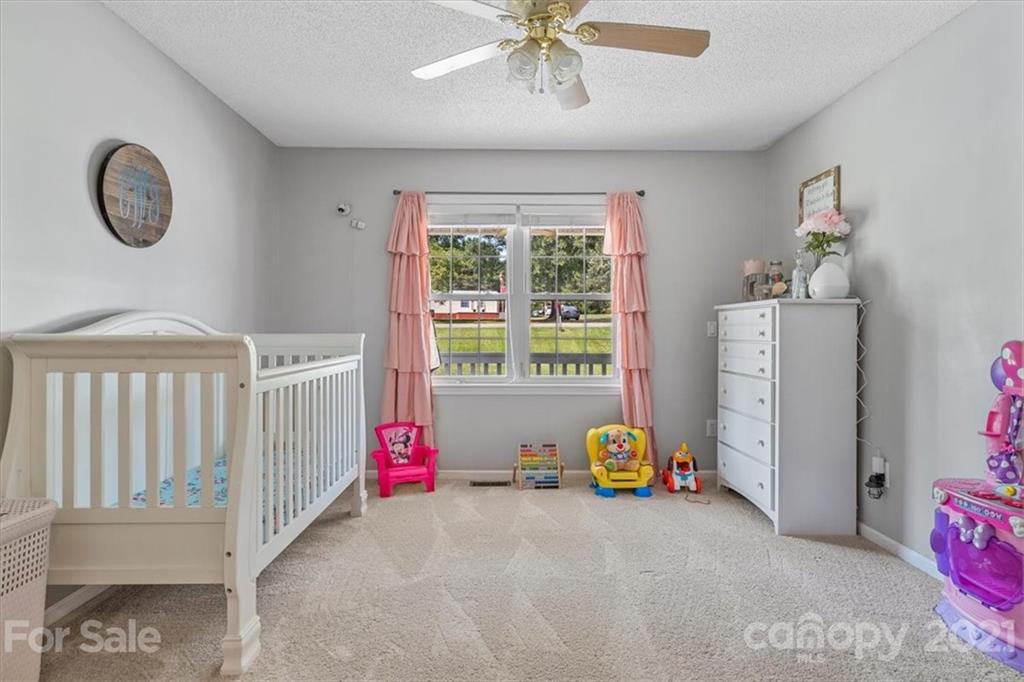 308 Kiser Road Bessemer City, NC 28016 - Photo 22 of 32 a view of an empty room with a window