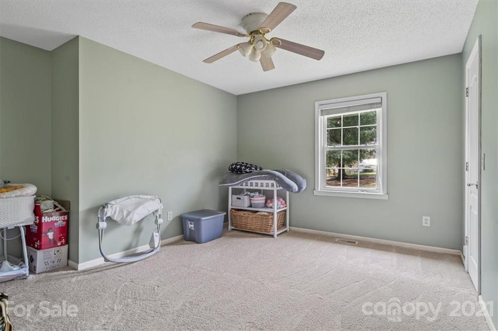 308 Kiser Road Bessemer City, NC 28016 - Photo 24 of 32 a bedroom with furniture and a window