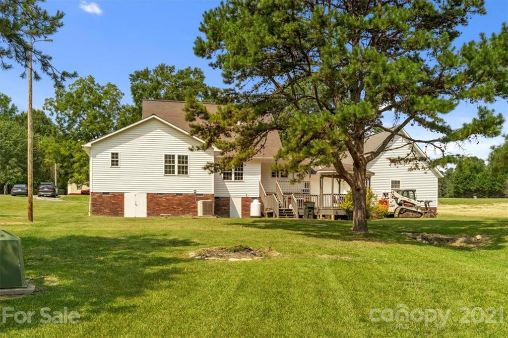 308 Kiser Road Bessemer City, NC 28016 - Photo 29 of 32 a view of a house with a yard