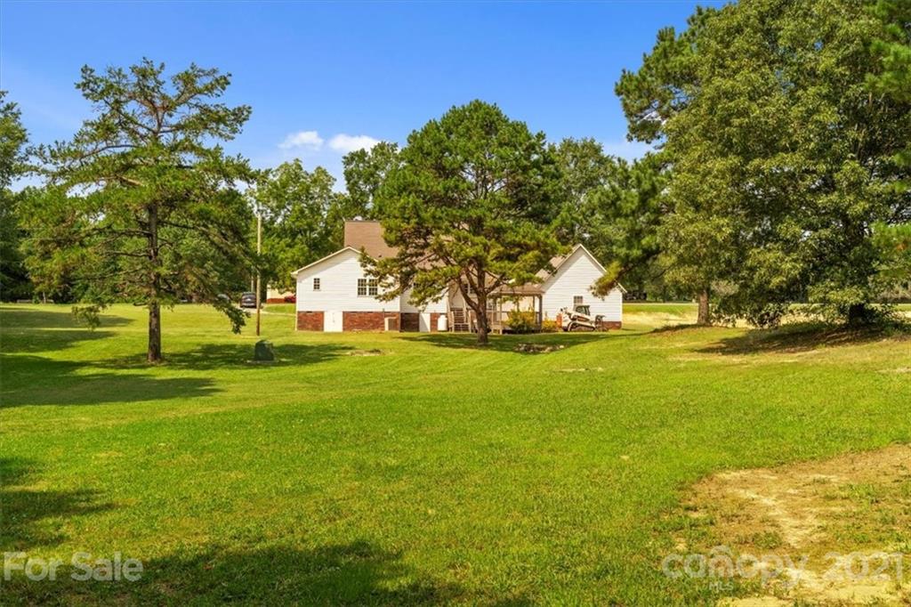 308 Kiser Road Bessemer City, NC 28016 - Photo 30 of 32 a view of yard with swimming pool