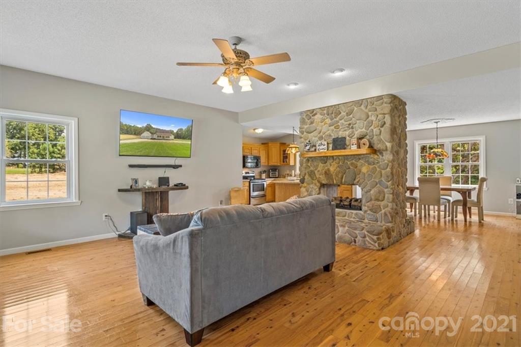 308 Kiser Road Bessemer City, NC 28016 - Photo 6 of 32 a living room with furniture and a flat screen tv