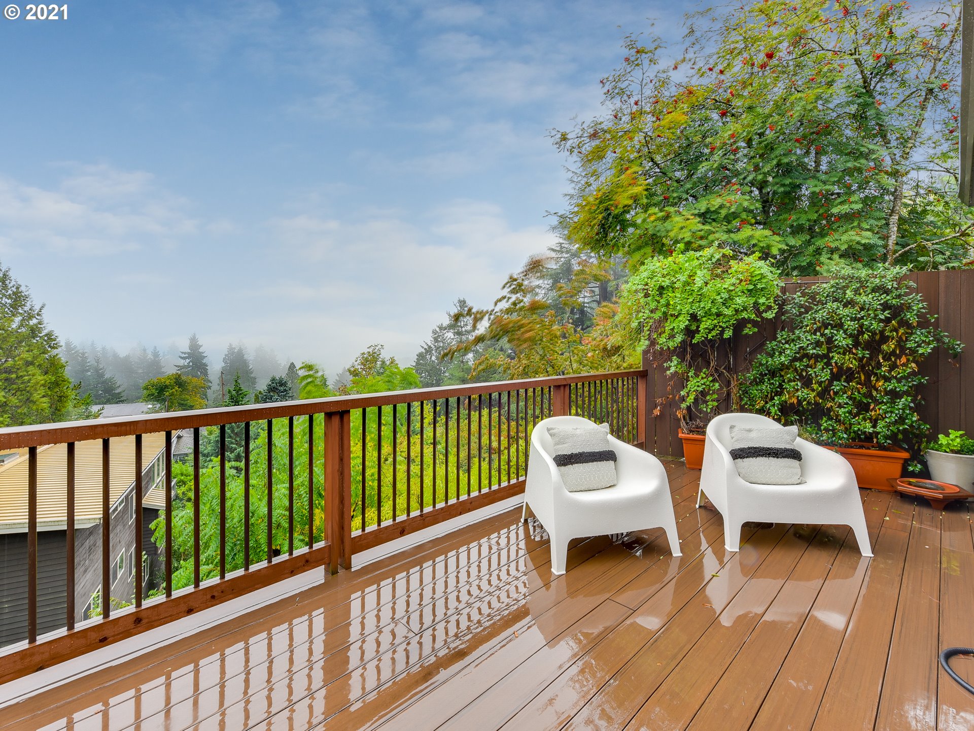 3630 Southwest Patton Road Portland, OR 97221 - Photo 14 of 29 a view of a two chairs in the balcony