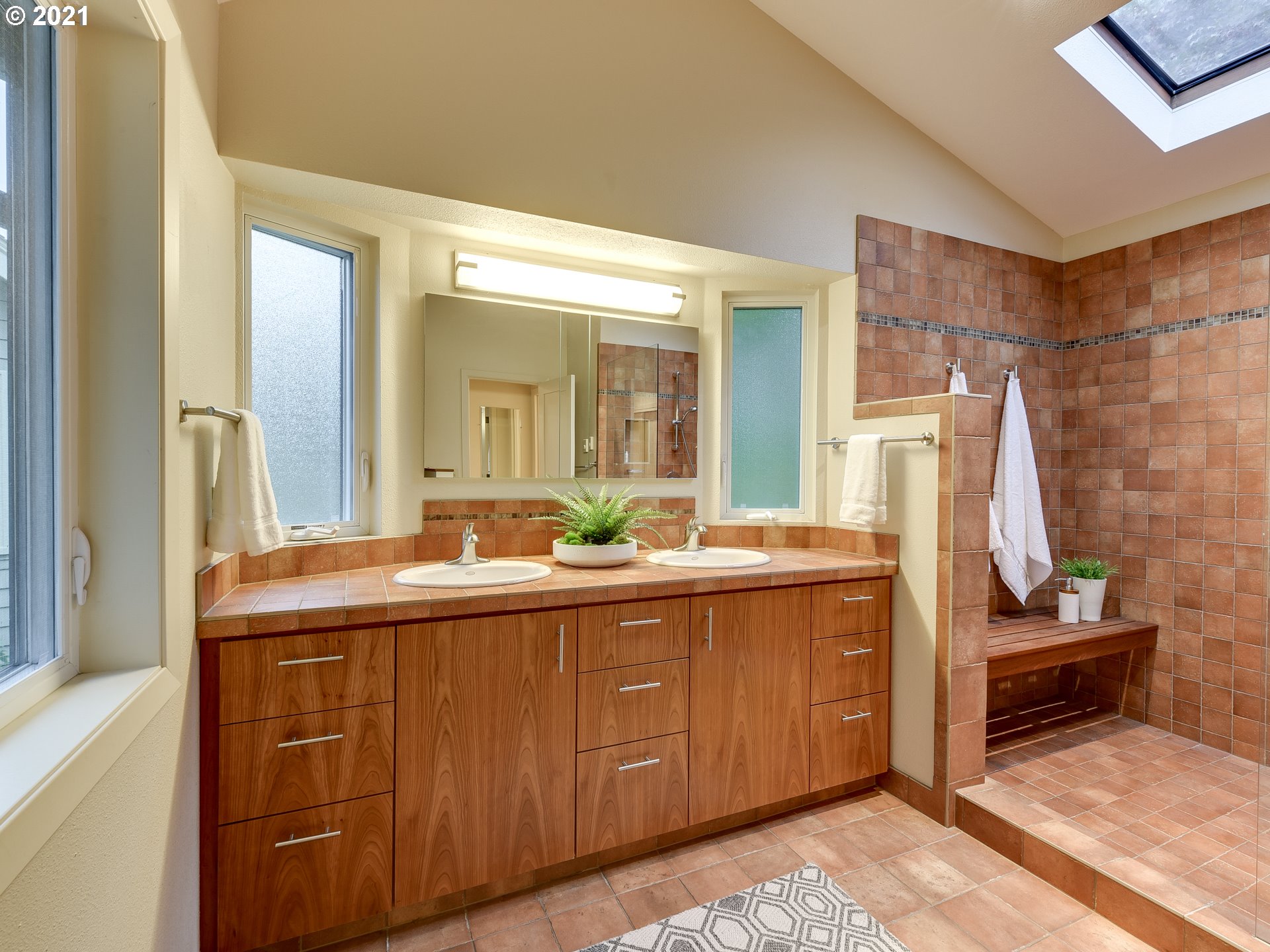3630 Southwest Patton Road Portland, OR 97221 - Photo 18 of 29 a bathroom with a sink and a mirror