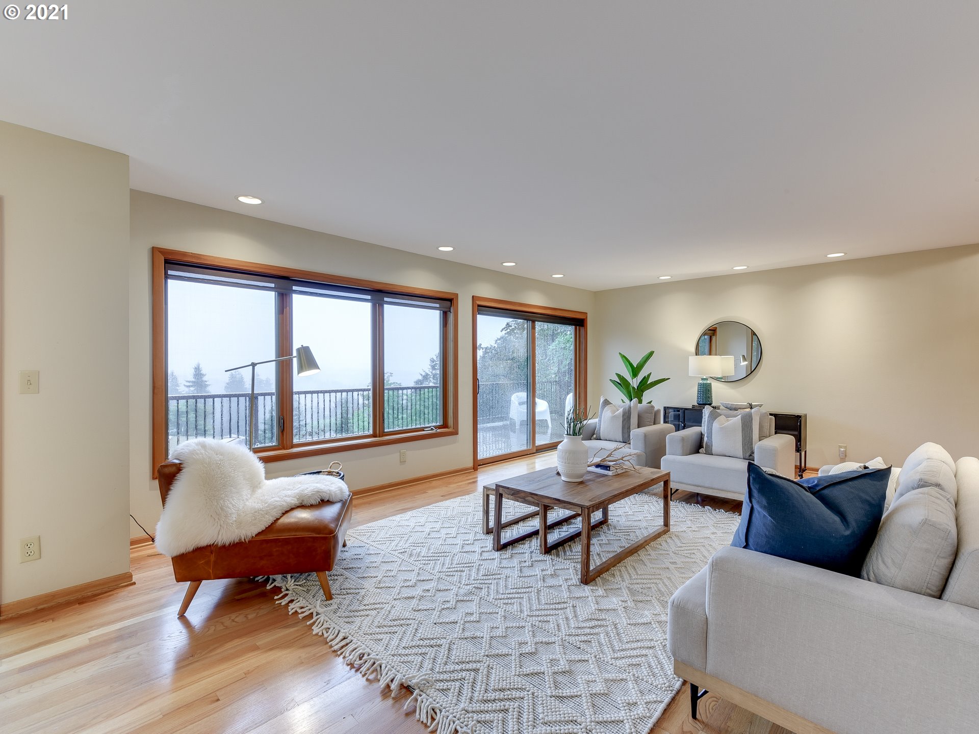 3630 Southwest Patton Road Portland, OR 97221 - Photo 6 of 29 a living room with furniture and a floor to ceiling window