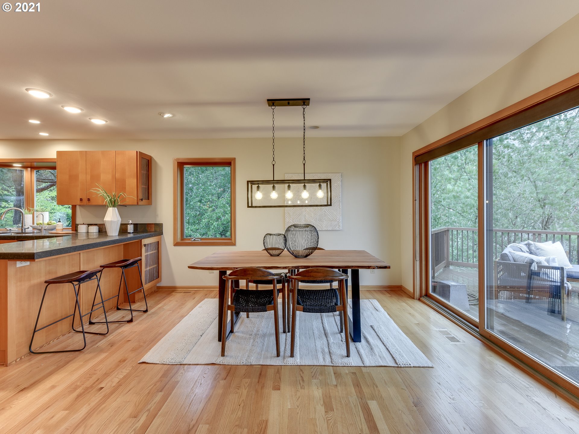 3630 Southwest Patton Road Portland, OR 97221 - Photo 8 of 29 a view of a dining room with furniture window and wooden floor