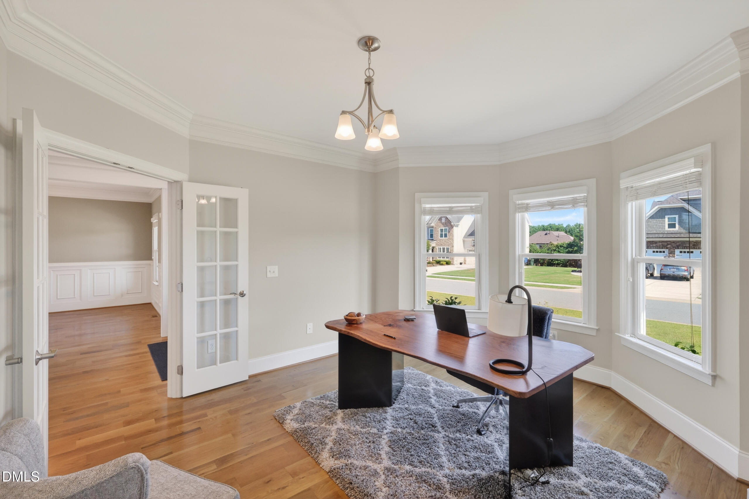 261 Character Drive Rolesville, NC 27571 - Photo 14 of 77 a view of a livingroom with furniture window and wooden floor