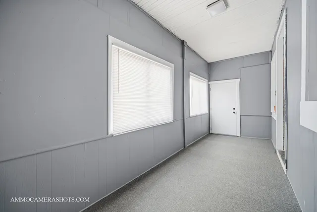 a view of entryway with a front door