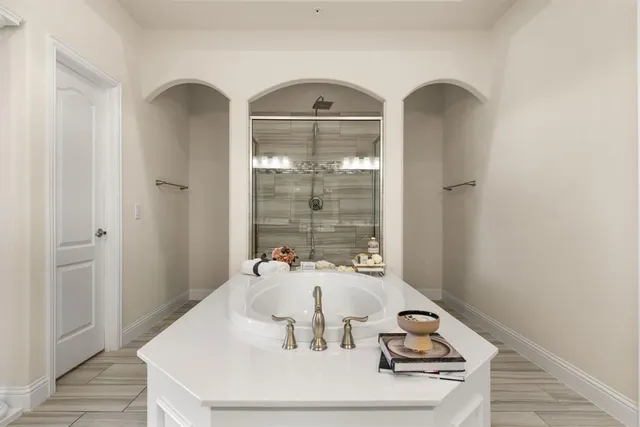 a view of dining room with furniture and wooden floor