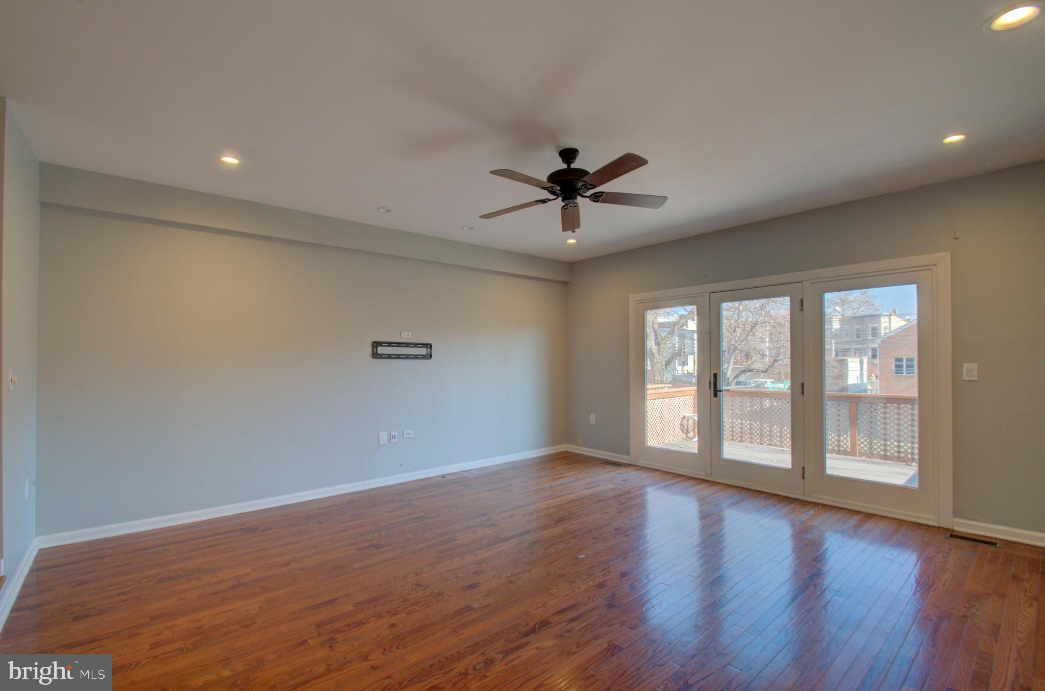 1159 5th Street Northeast Washington, DC 20002 - Photo 15 of 43 Walkout onto deck from living room