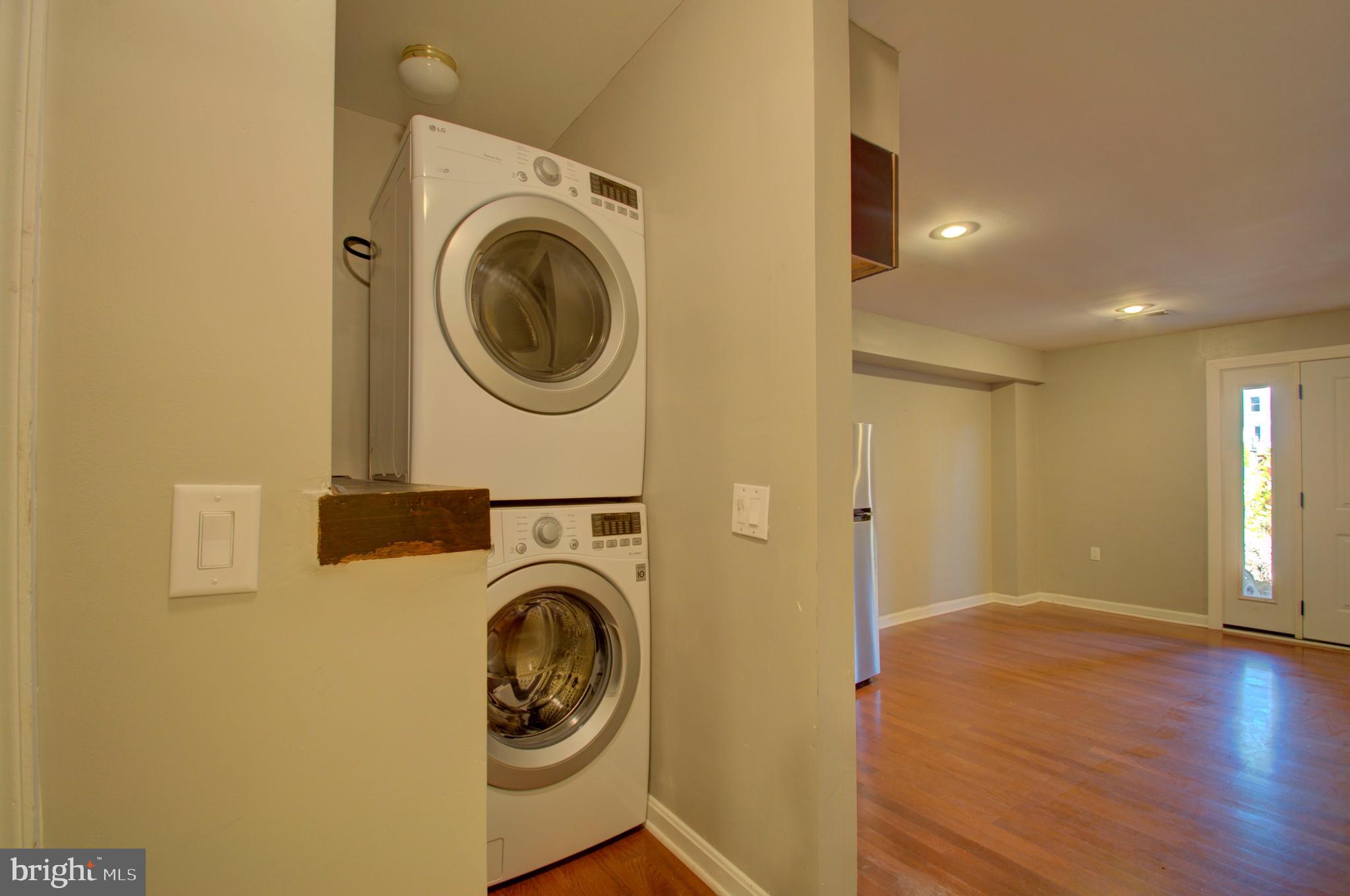 1159 5th Street Northeast Washington, DC 20002 - Photo 35 of 43 Second washer dryer set in basement