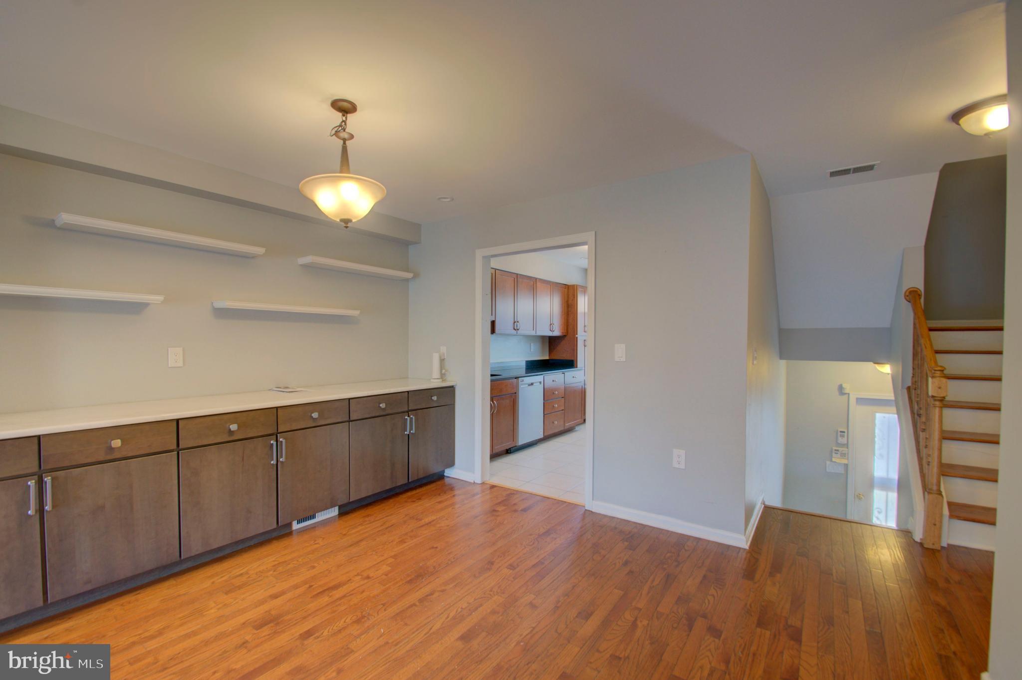 1159 5th Street Northeast Washington, DC 20002 - Photo 7 of 43 Enormous dining room with bar cabinet