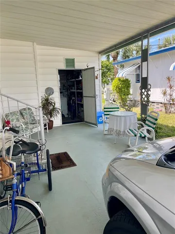 a room with furniture and a flat screen tv