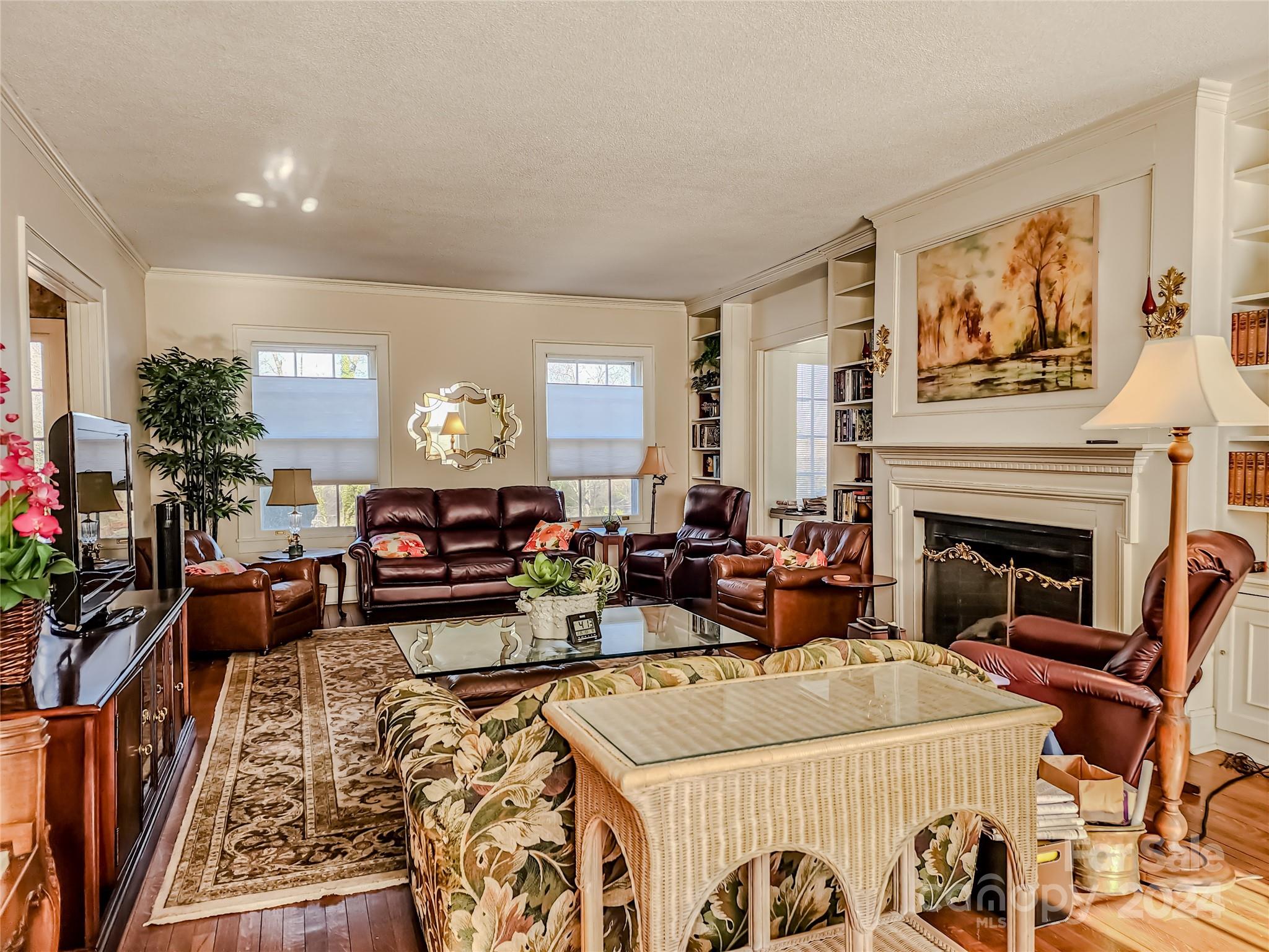 535 North Washington Street Rutherfordton, NC 28139 - Photo 13 of 48 a living room with furniture and a fireplace
