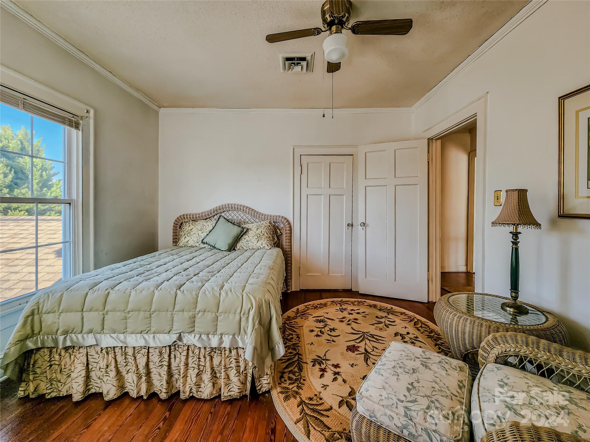 535 North Washington Street Rutherfordton, NC 28139 - Photo 25 of 48 a bedroom with a bed and a dresser