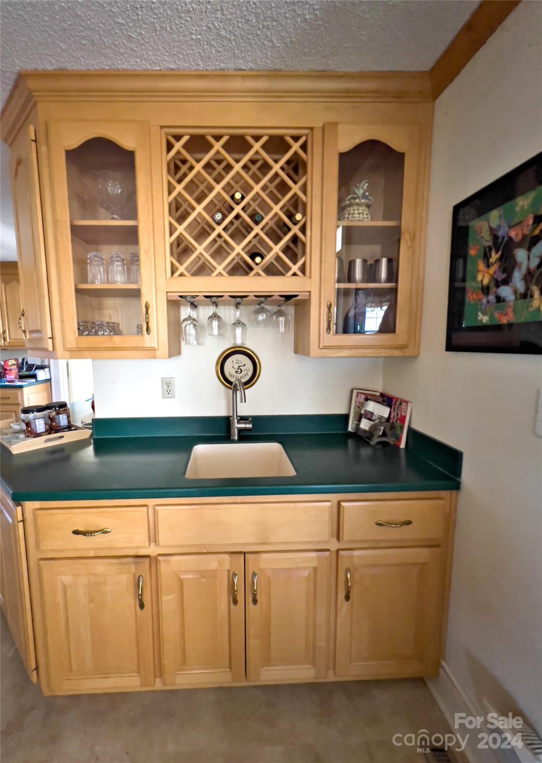 535 North Washington Street Rutherfordton, NC 28139 - Photo 40 of 48 a kitchen with white cabinets and sink
