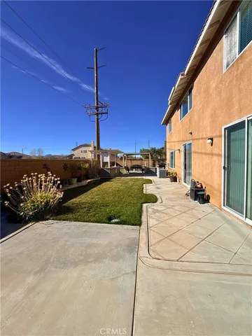 a view of a house with a street