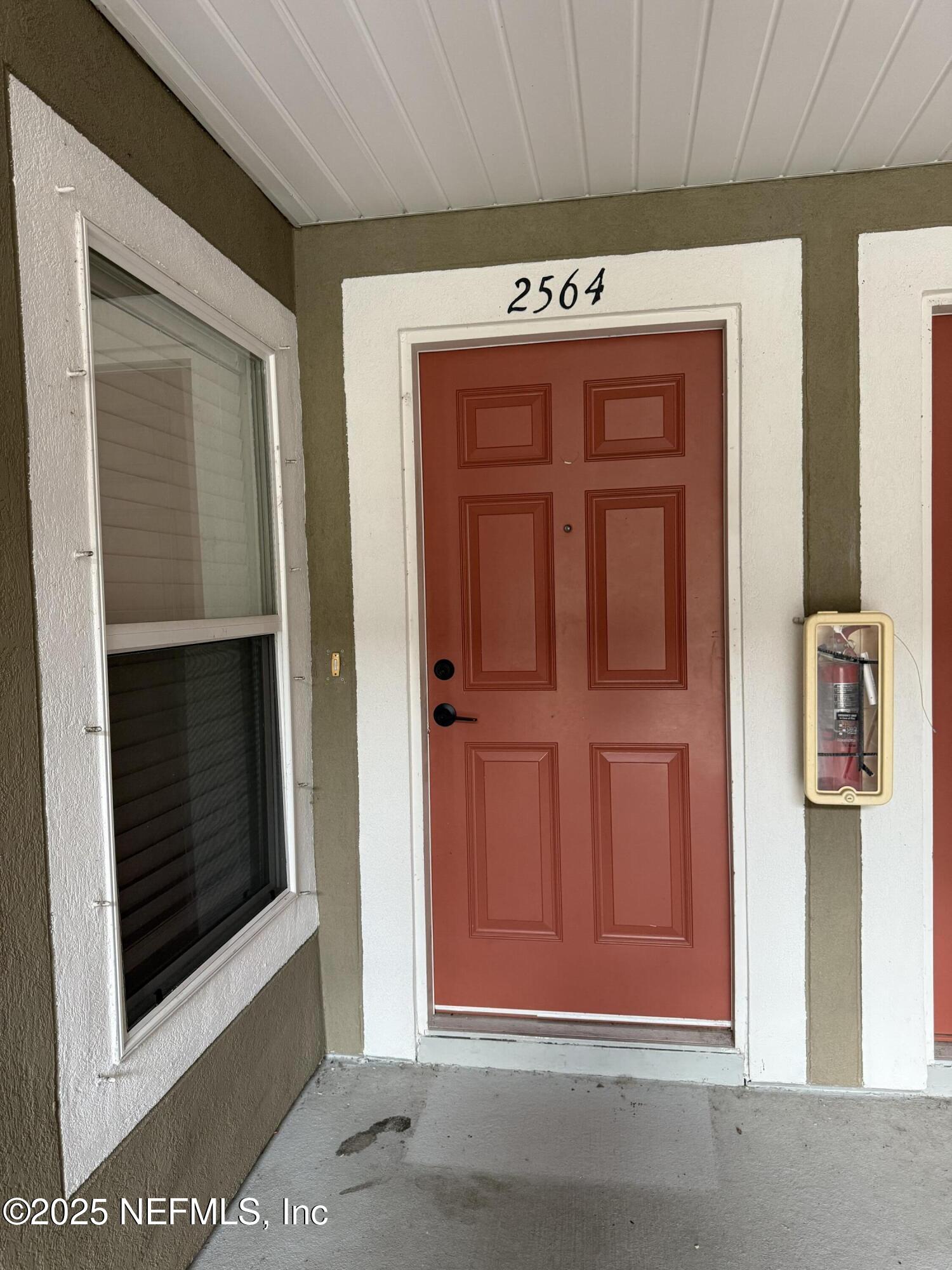 2564 Golden Lake Loop St. Augustine, FL 32084 - Photo 17 of 24 a view of front door of house