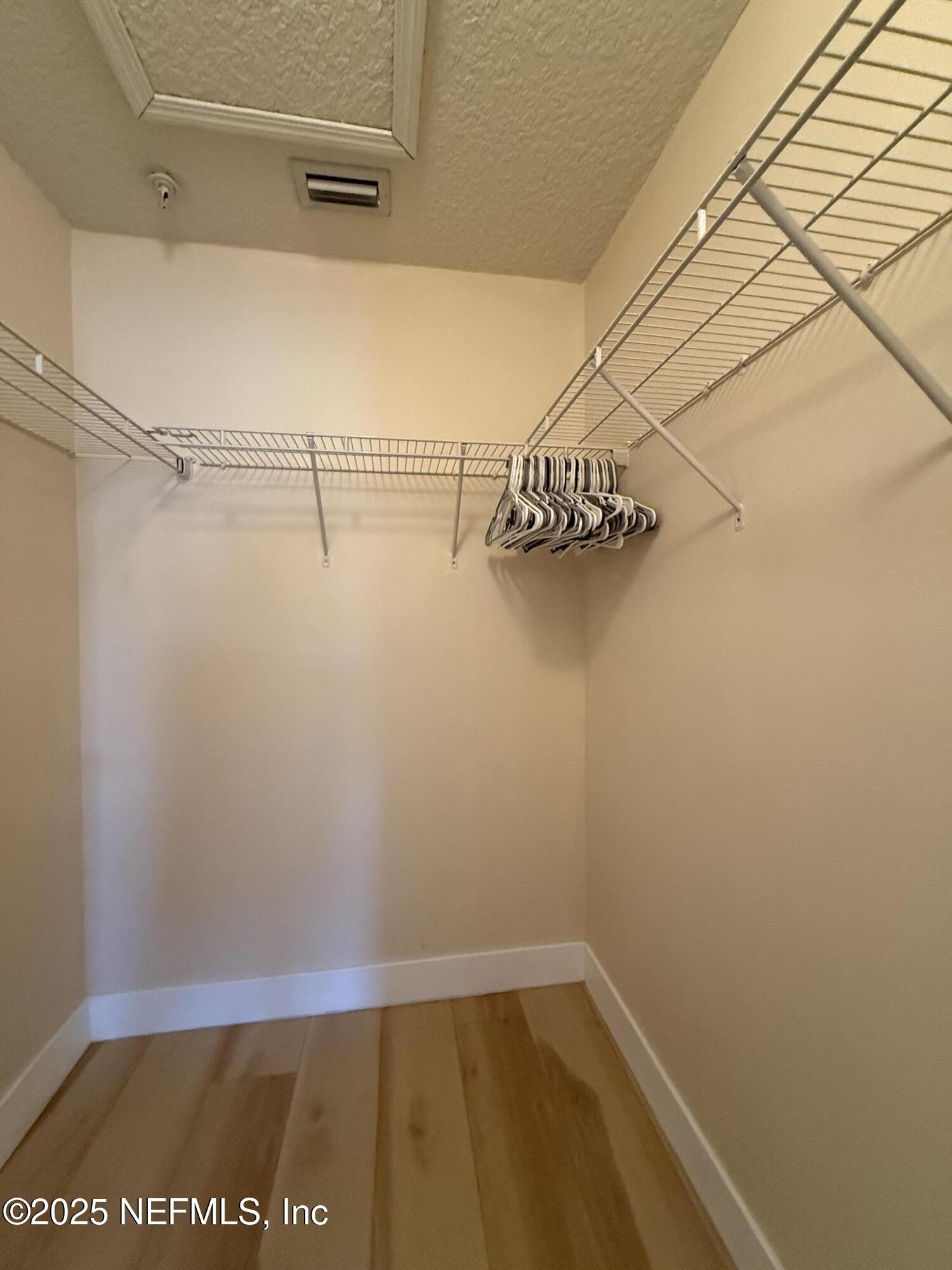 2564 Golden Lake Loop St. Augustine, FL 32084 - Photo 10 of 24 a view of a room with racks on the wall