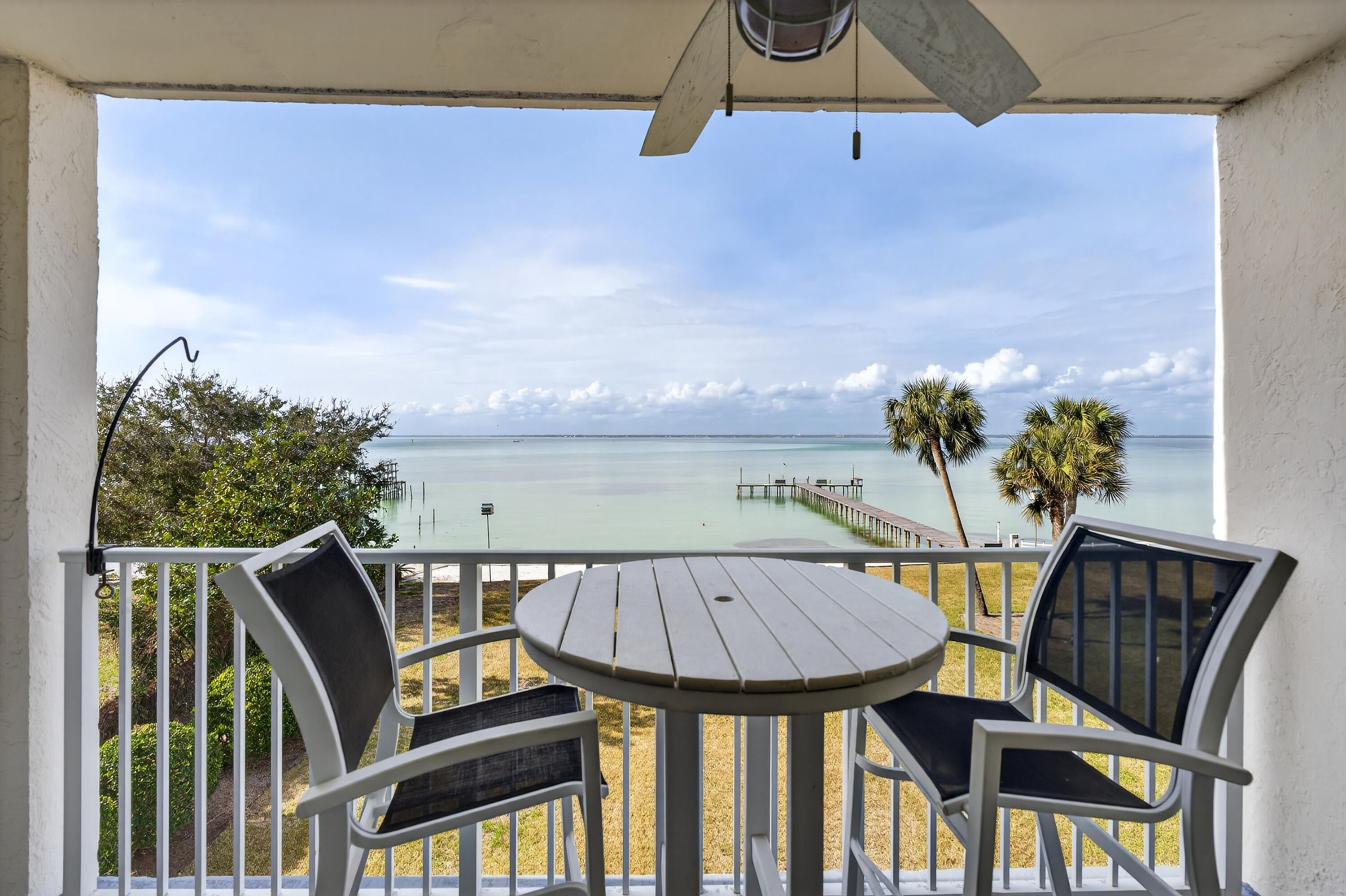 151 Calhoun Avenue, Unit 301 Destin, FL 32541 - Photo 1 of 43 a view of a balcony with furniture