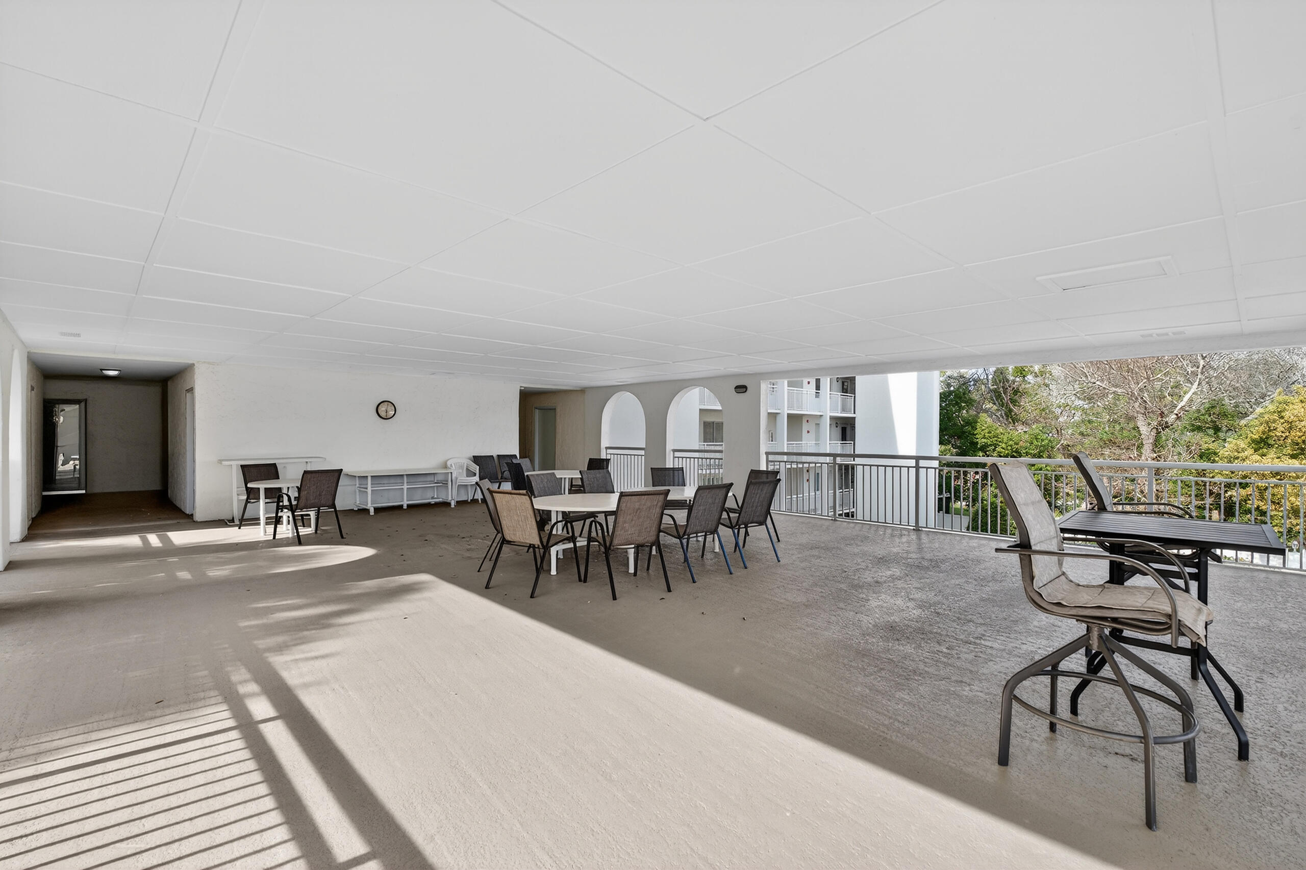 151 Calhoun Avenue, Unit 301 Destin, FL 32541 - Photo 29 of 43 a dining room with furniture and a floor to ceiling window