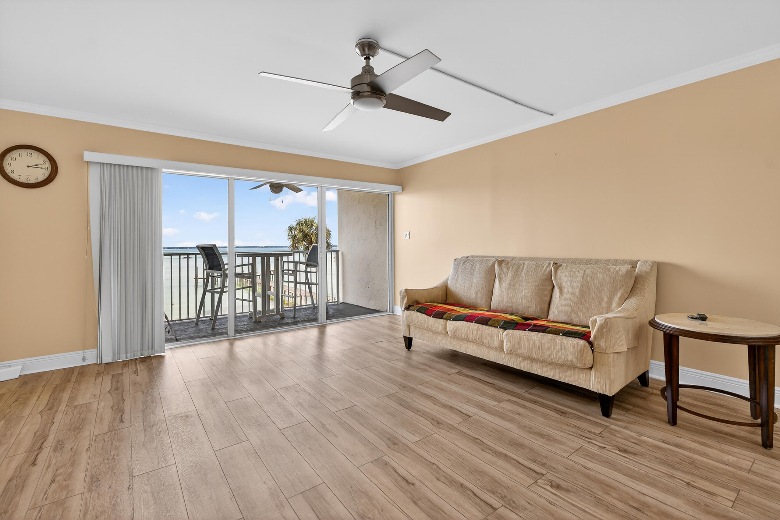 151 Calhoun Avenue, Unit 301 Destin, FL 32541 - Photo 3 of 43 a living room with furniture and a wooden floor
