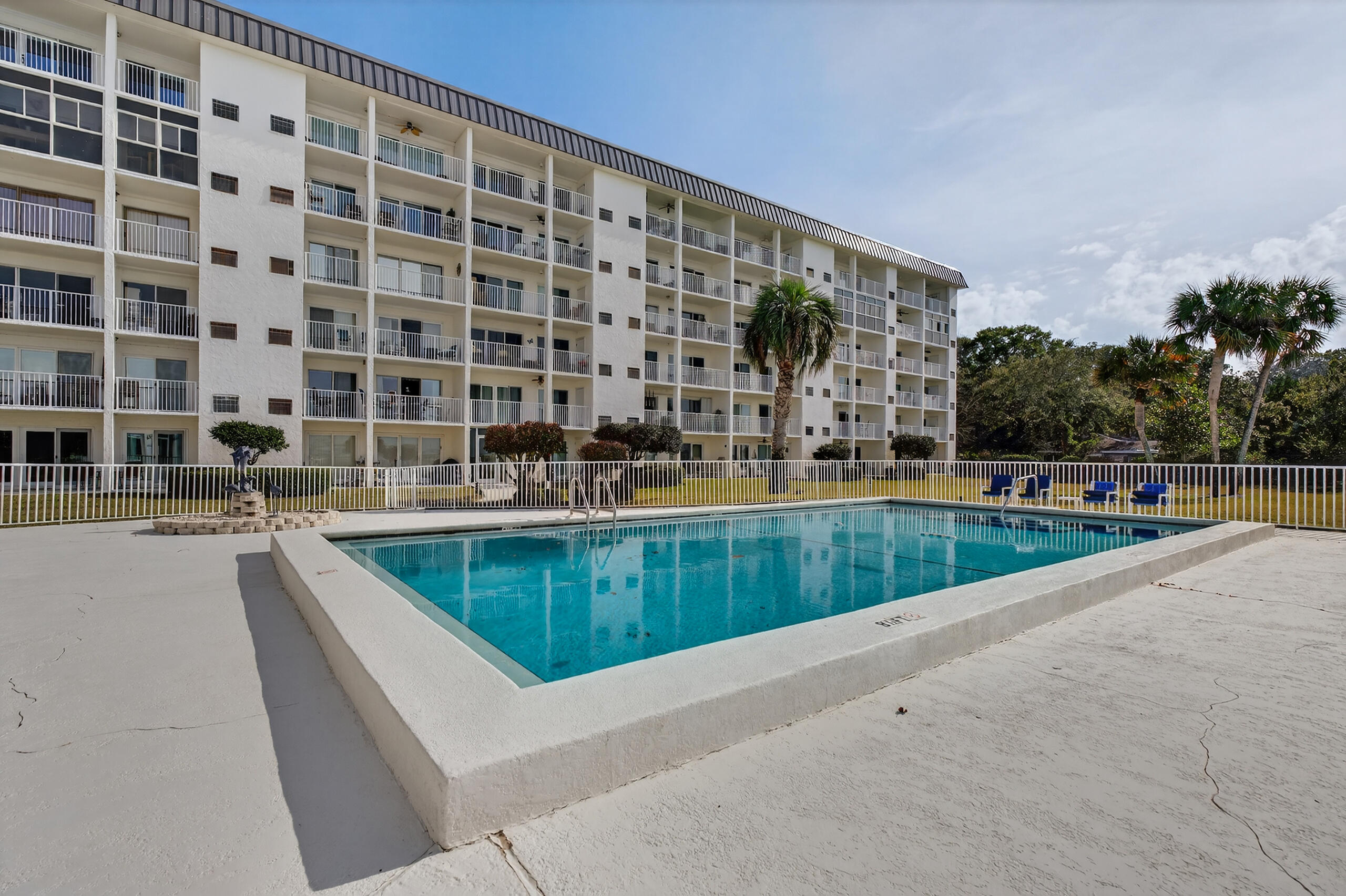 151 Calhoun Avenue, Unit 301 Destin, FL 32541 - Photo 36 of 43 a view of swimming pool with outdoor seating