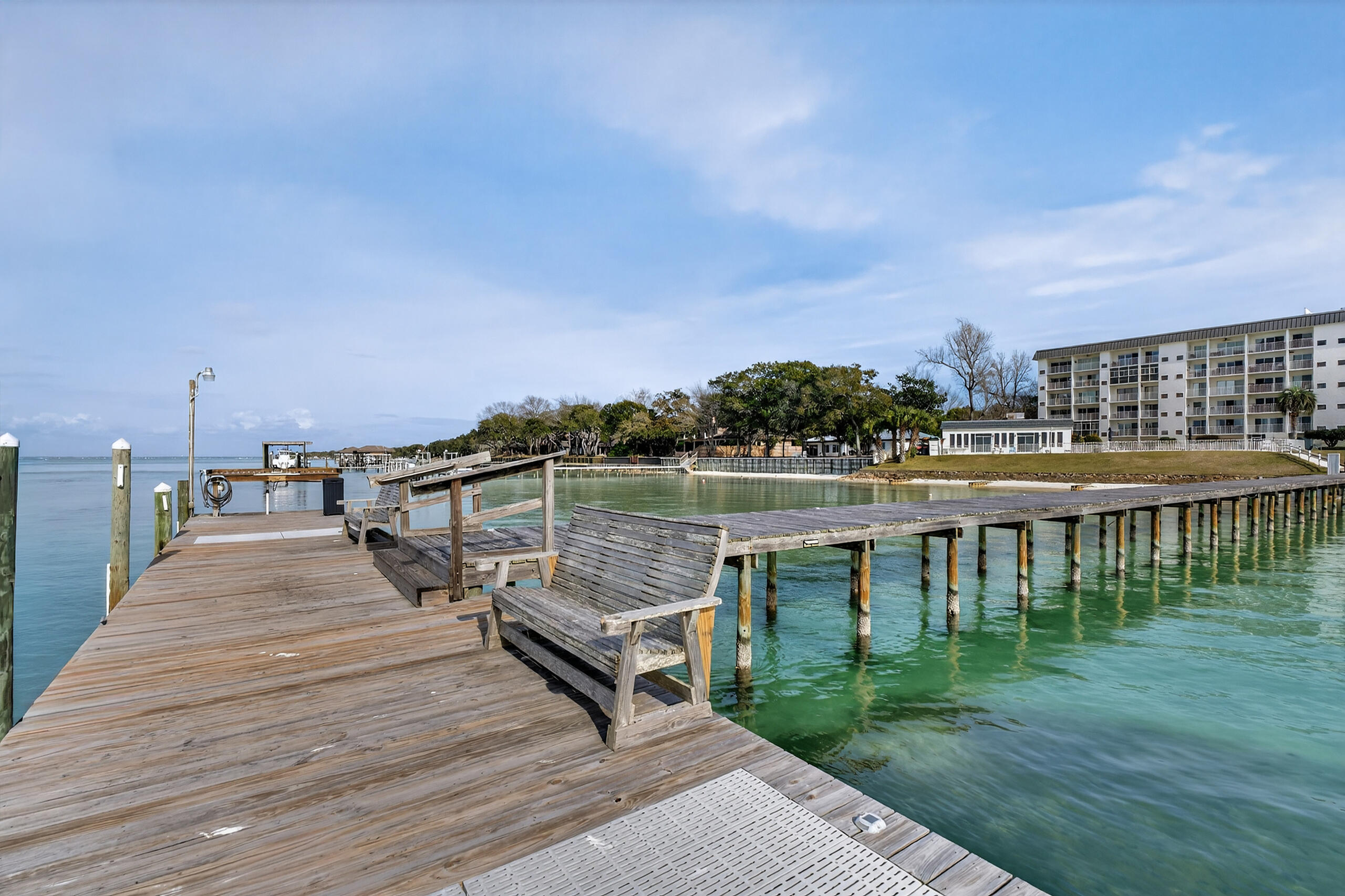 151 Calhoun Avenue, Unit 301 Destin, FL 32541 - Photo 39 of 43 a view of a lake with outdoor seating and city view