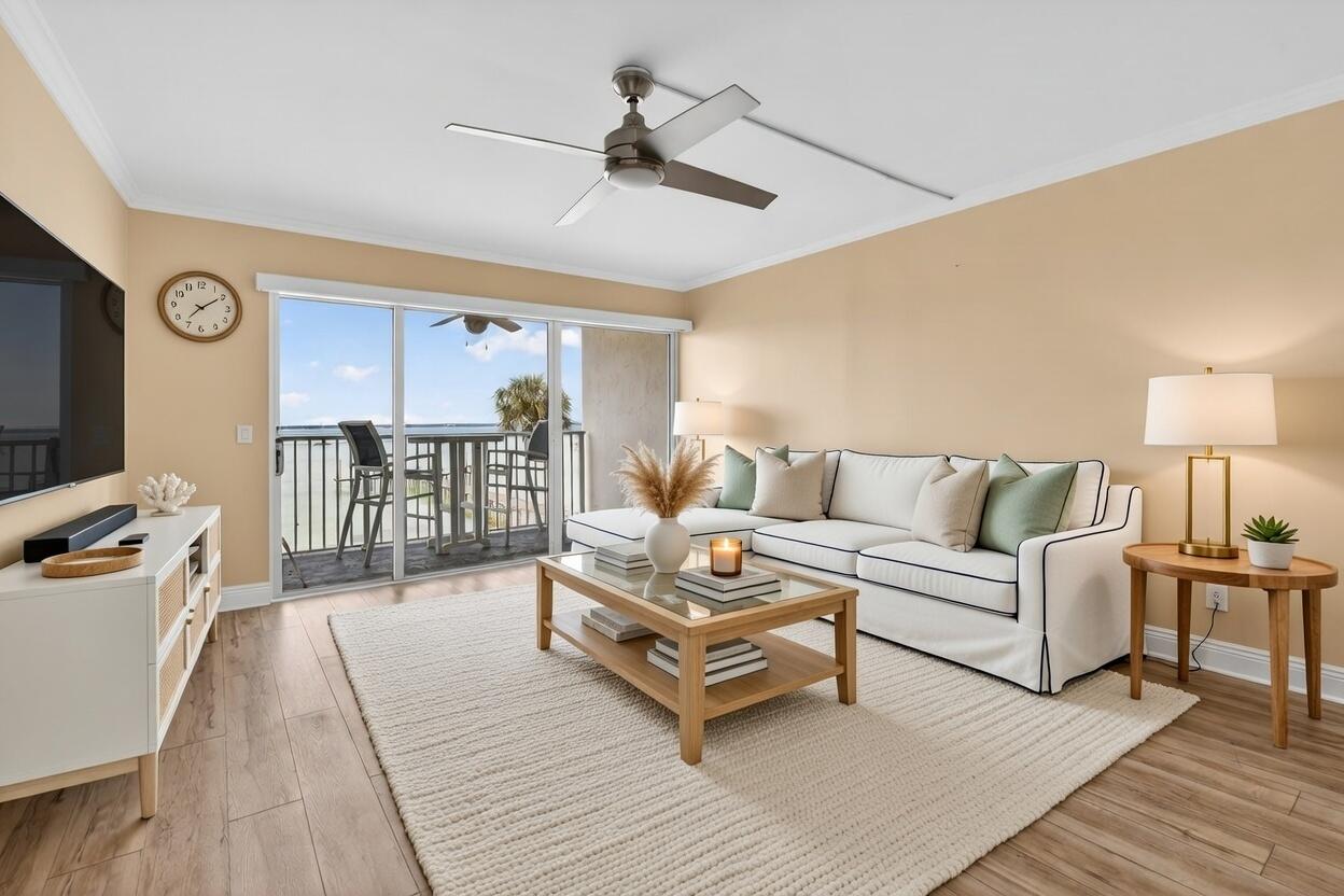 151 Calhoun Avenue, Unit 301 Destin, FL 32541 - Photo 5 of 43 a living room with furniture and a wooden floor