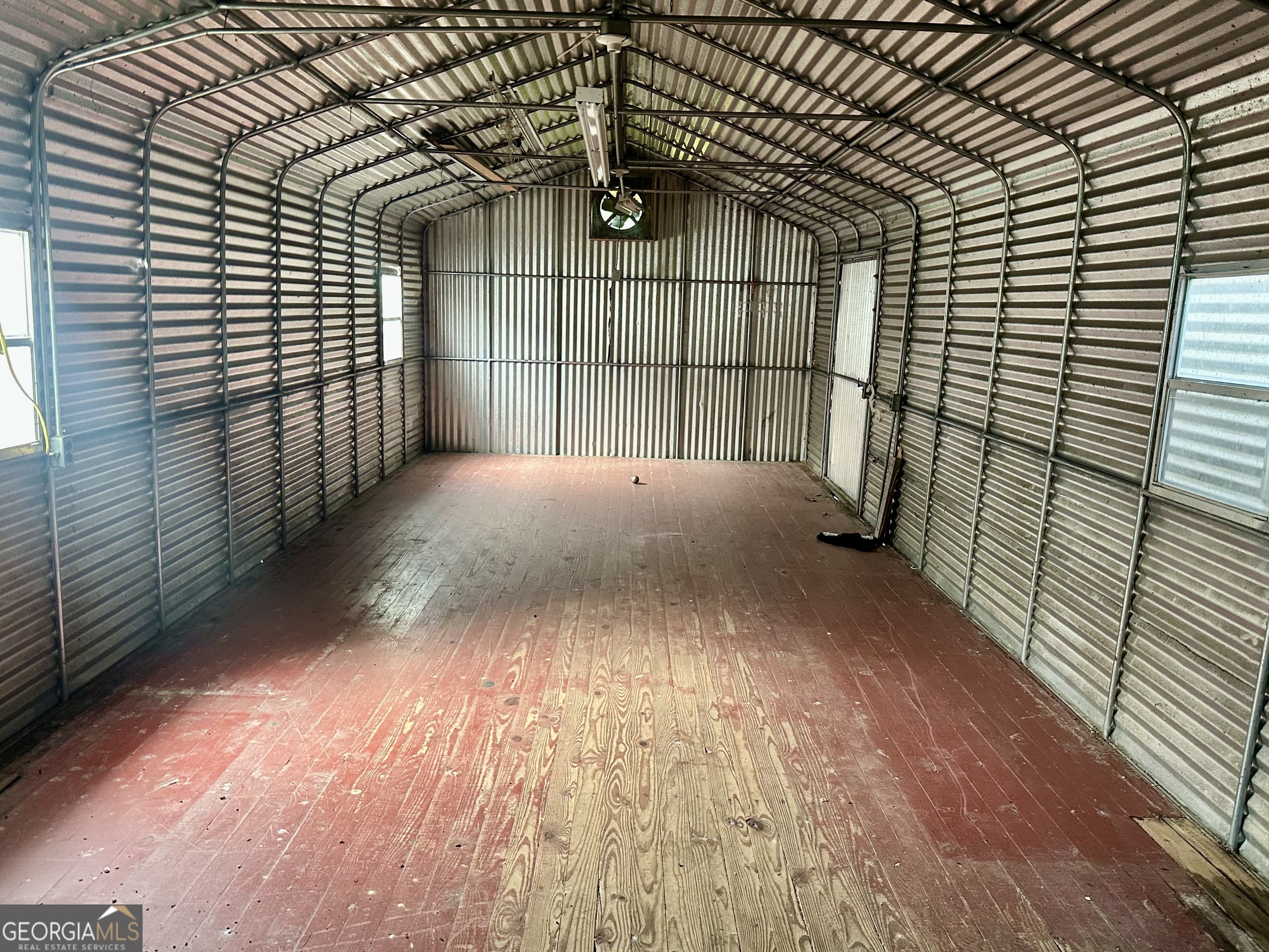 3344 Strickland Avenue Blackshear, GA 31516 - Photo 6 of 17 a view of empty room with wooden floor