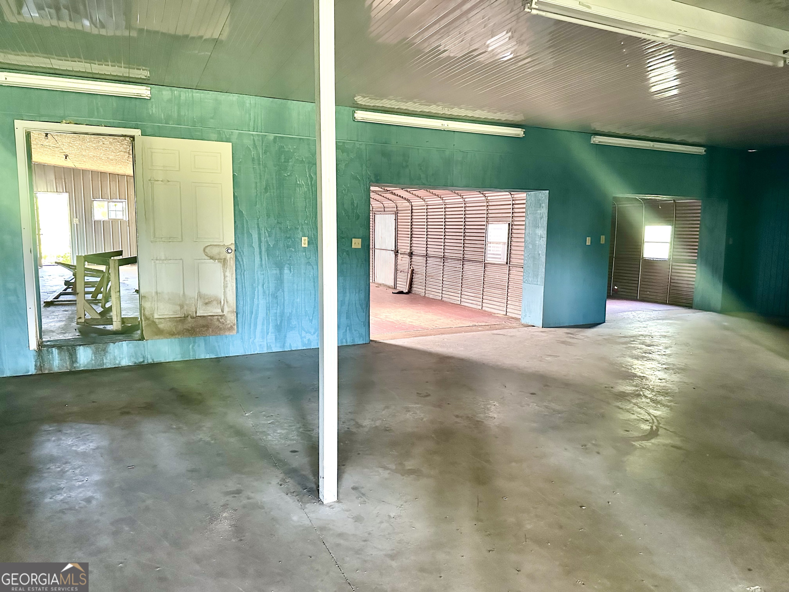 3344 Strickland Avenue Blackshear, GA 31516 - Photo 7 of 17 a view of a hallway with an empty room