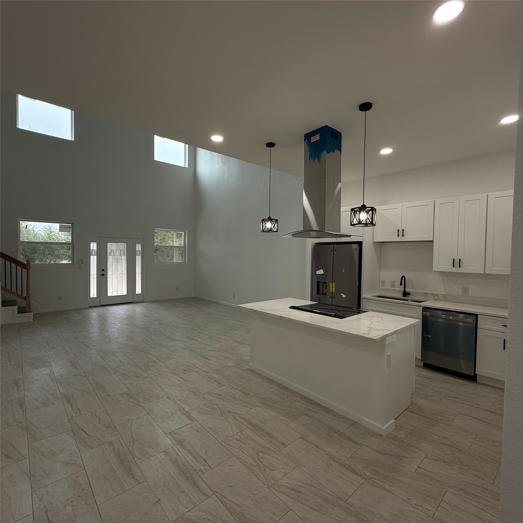 118 Crazy Cross Road Wimberley, TX 78676 - Photo 6 of 18 a view of kitchen with a sink and a stove top oven