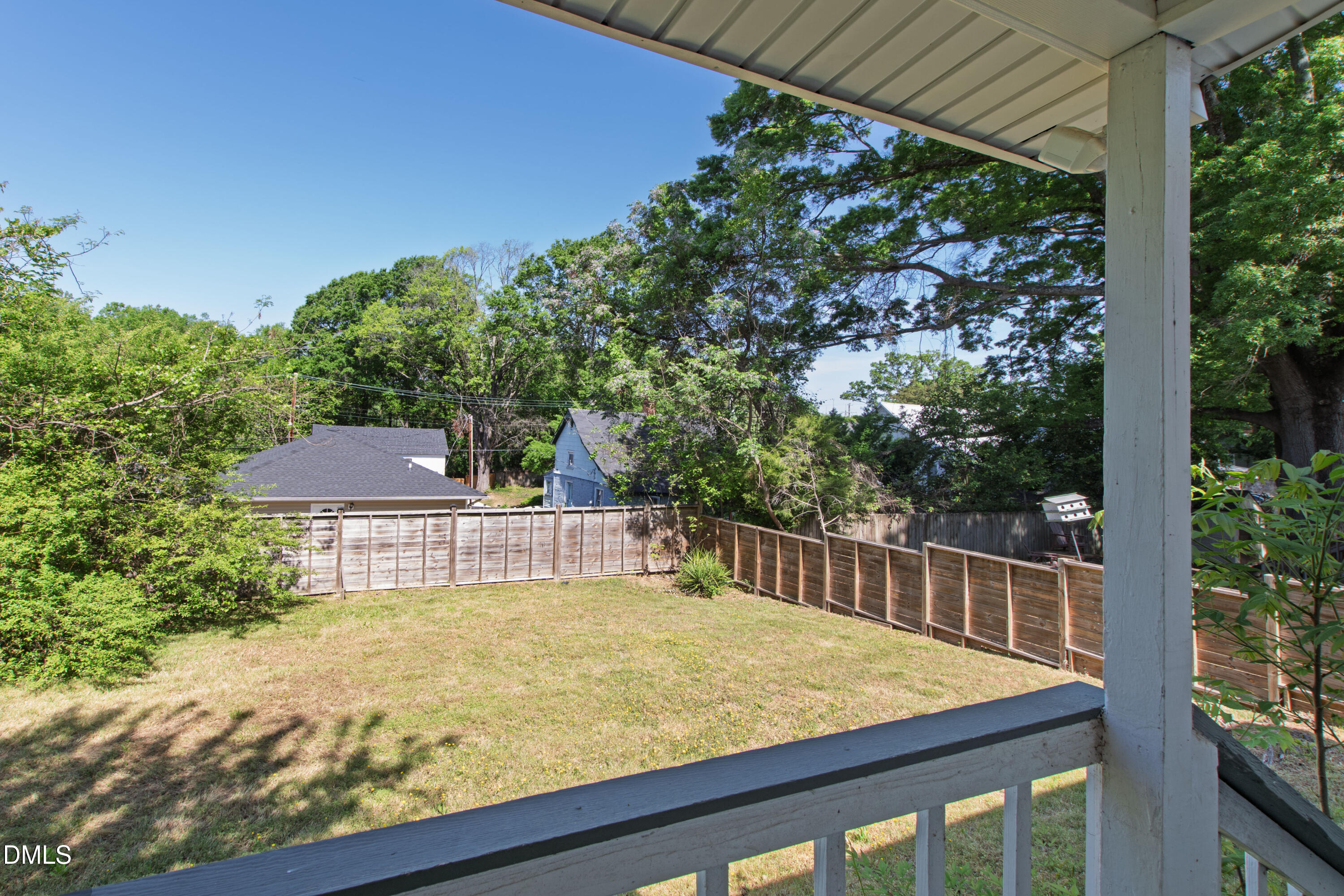 913 Washington Street Durham, NC 27701 - Photo 29 of 37 a view of a chairs and table on the wooden deck