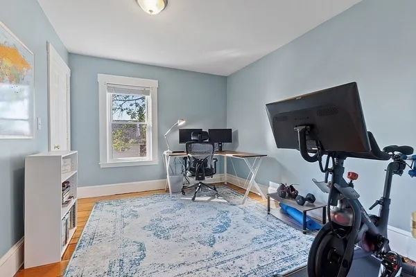 a room with furniture and a window