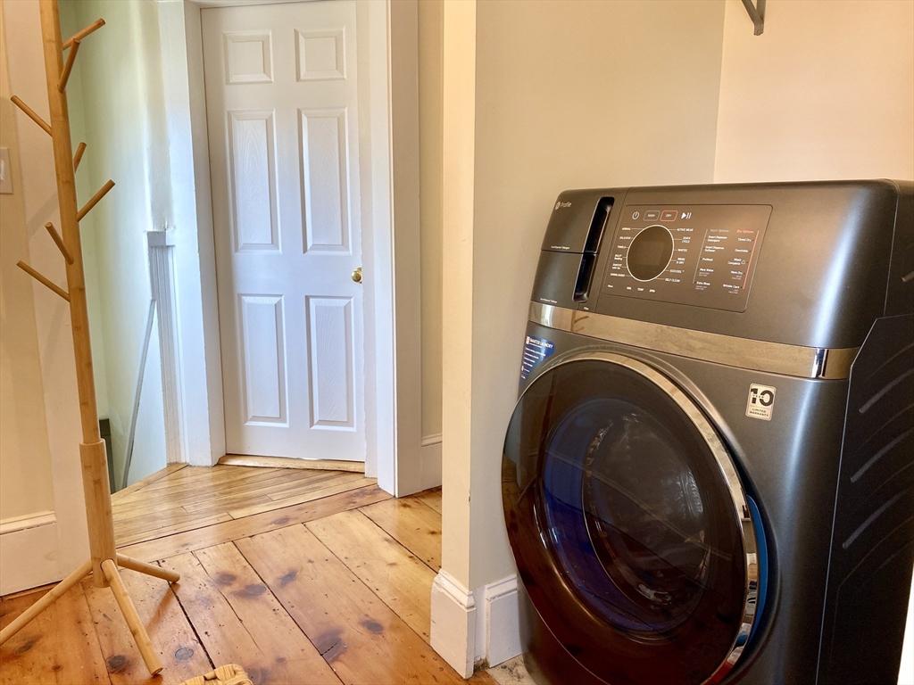30 Maple Avenue, Unit 2 North Andover, MA 01845 - Photo 8 of 17 a view of a hallway with washer and dryer