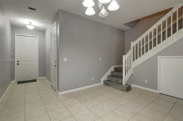 a view of an entryway with staircase