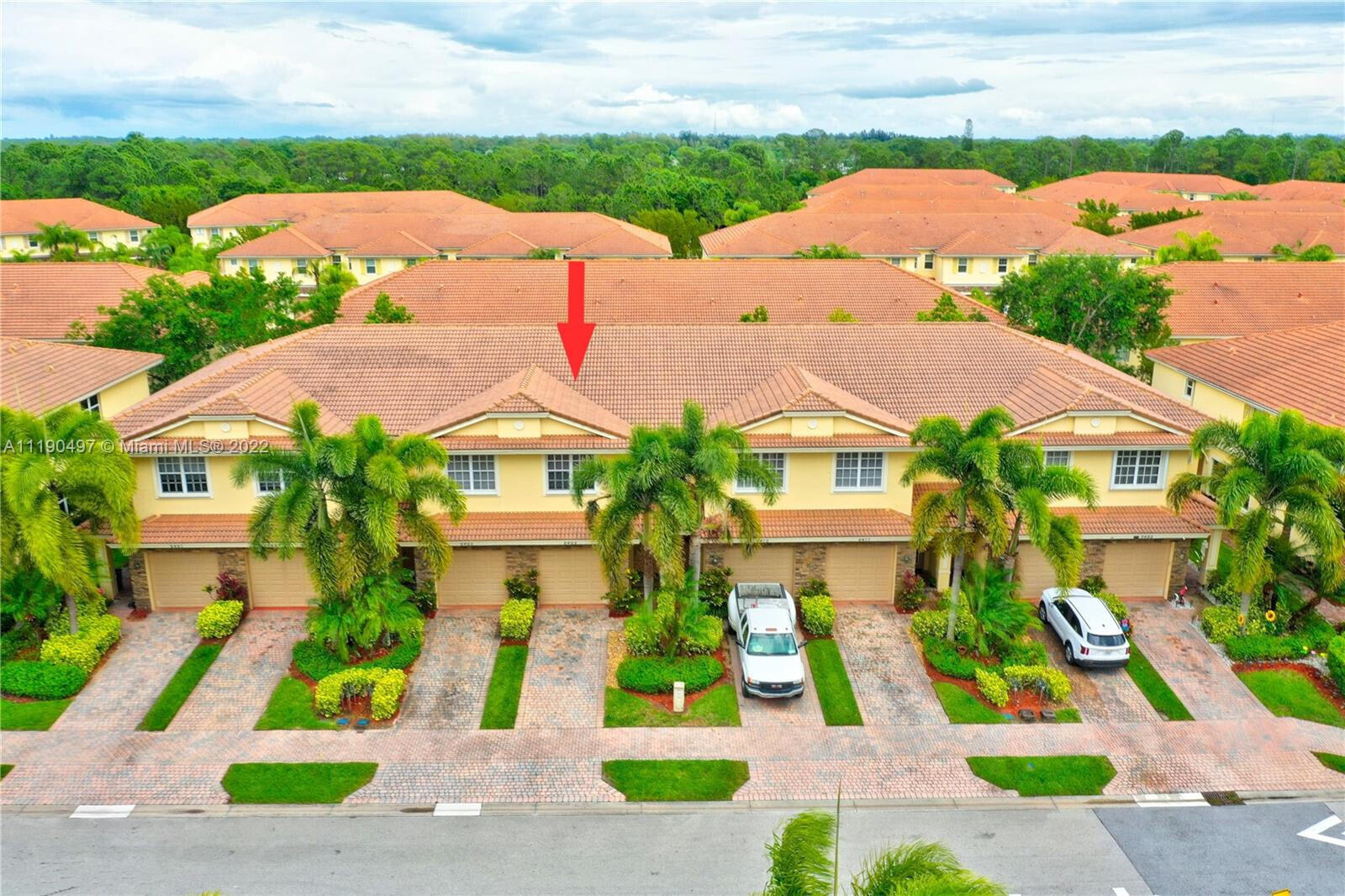 9469 Southwest Purple Martin Way Stuart, FL 34997 - Photo 7 of 21 a view of multiple houses with yard