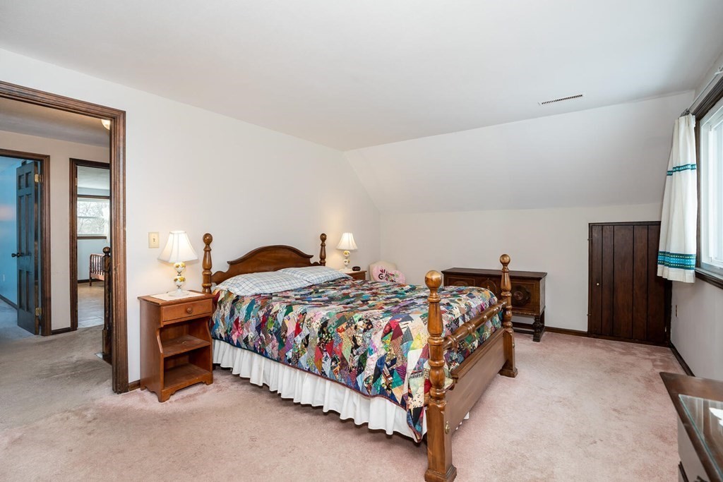 1299 Bay Road Amherst, MA 01002 - Photo 25 of 42 a bedroom with a bed and a cabinets