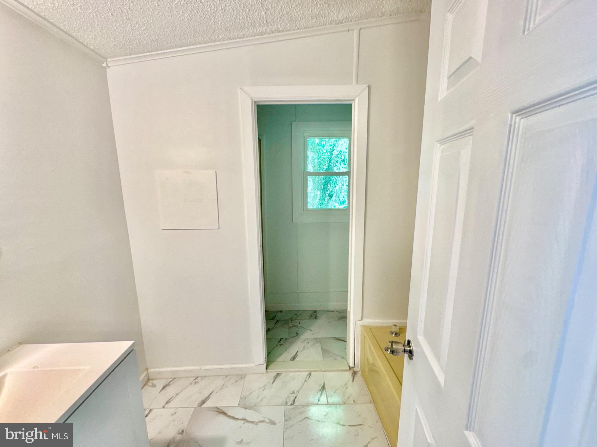 448 Evergreen Road Millville, NJ 08332 - Photo 22 of 25 a bathroom with a sink and a mirror