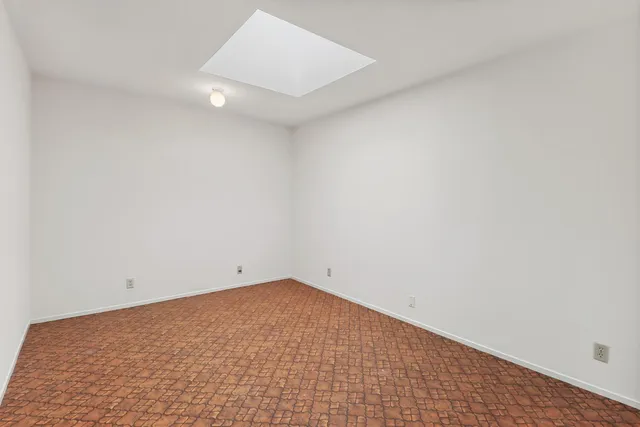 an empty room with an entryway