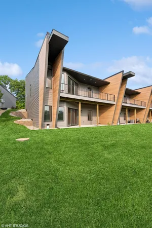 a brick building with a yard