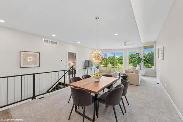 a view of a dining room with furniture window and outside view