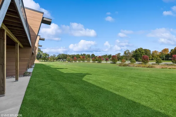 a view of a backyard with garden