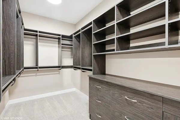 a view of an empty walk in closet