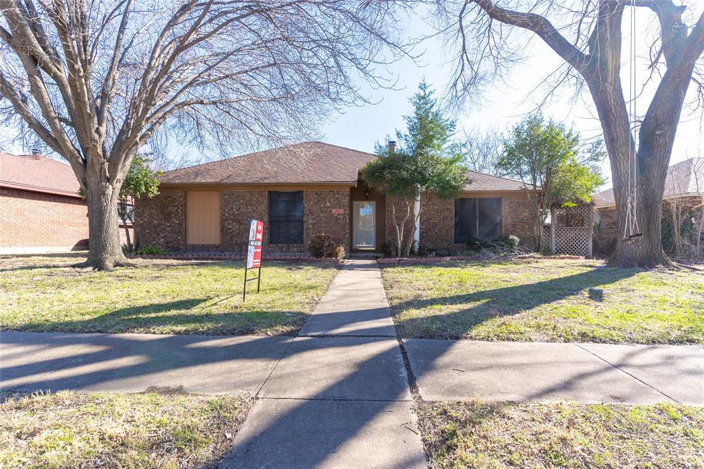 a front view of a house with swimming pool and porch with furniture