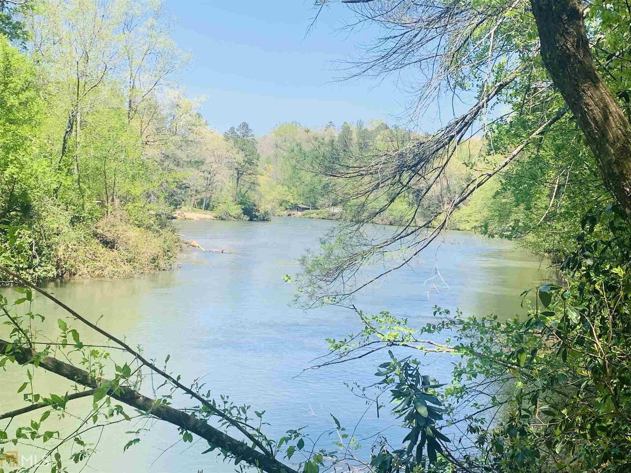 0 Old River Road, Unit 12 Cornelia, GA 30531 - Photo 1 of 1 a view of a lake in between the trees