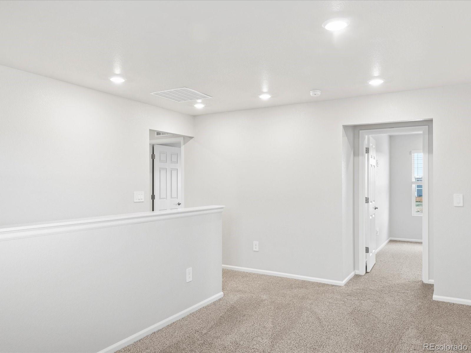 7331 West 27th Street Greeley, CO 80634 - Photo 20 of 40 an empty room with cabinet and mirror